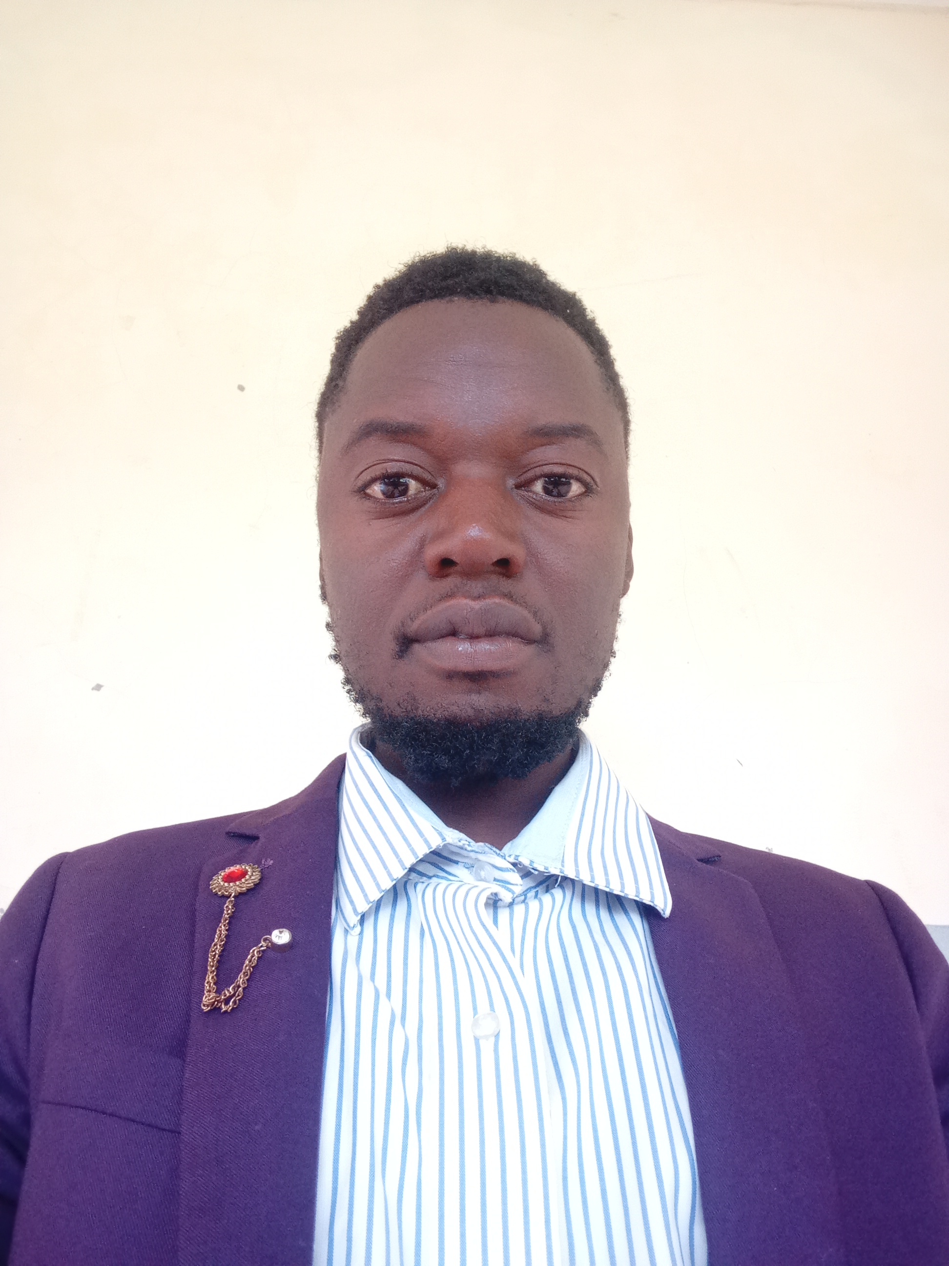 Mr.  MOSES JUNIOR KAKOI